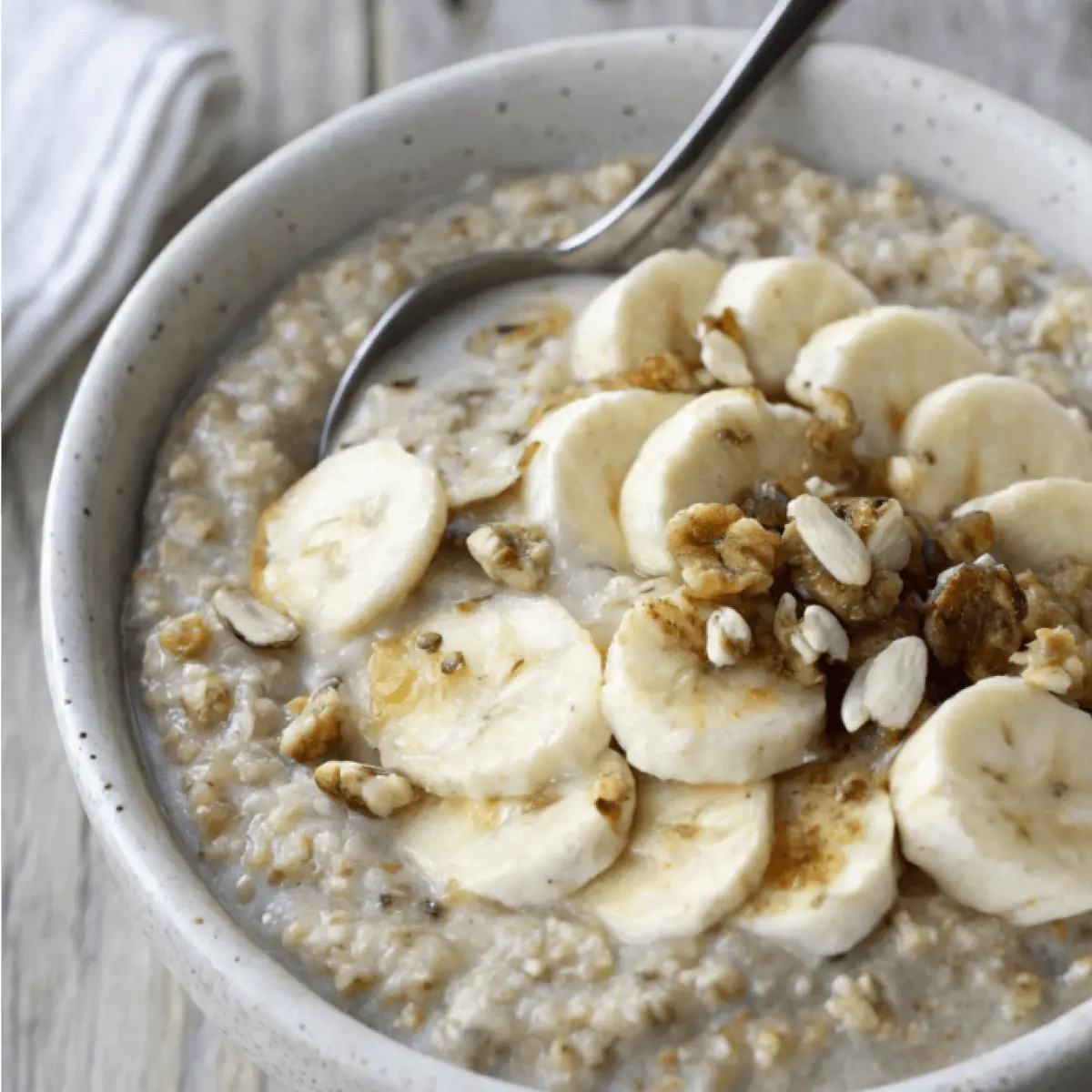 bananas and cream oatmeal in a bowl